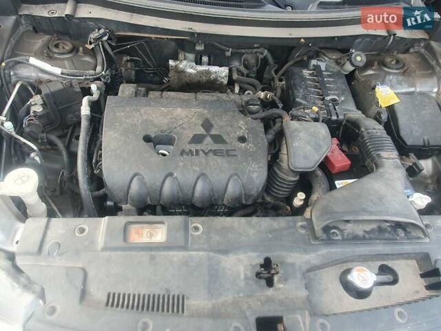 Сірий Міцубісі Аутлендер, об'ємом двигуна 2.36 л та пробігом 265 тис. км за 10300 $, фото 12 на Automoto.ua