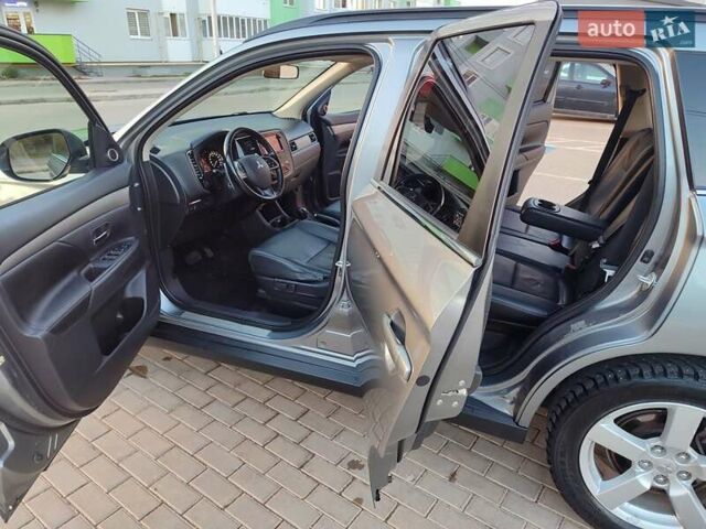 Серый Мицубиси Аутлендер, объемом двигателя 2.3 л и пробегом 250 тыс. км за 13999 $, фото 104 на Automoto.ua