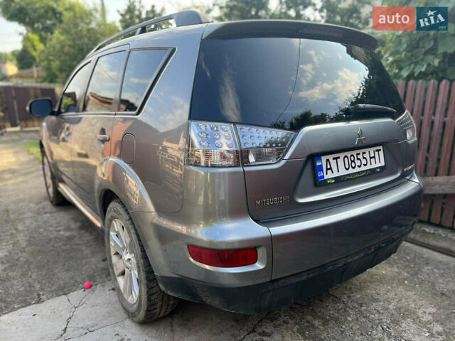 Серый Мицубиси Аутлендер, объемом двигателя 2.4 л и пробегом 278 тыс. км за 11300 $, фото 3 на Automoto.ua