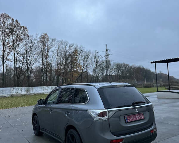 Серый Мицубиси Аутлендер, объемом двигателя 2.2 л и пробегом 206 тыс. км за 13700 $, фото 6 на Automoto.ua