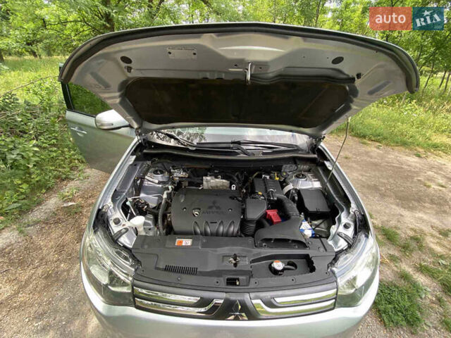 Серый Мицубиси Аутлендер, объемом двигателя 2 л и пробегом 203 тыс. км за 10999 $, фото 16 на Automoto.ua