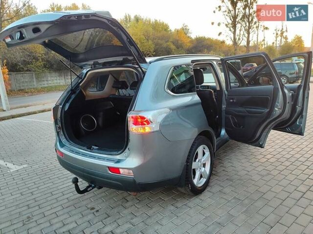 Серый Мицубиси Аутлендер, объемом двигателя 2.3 л и пробегом 250 тыс. км за 13499 $, фото 19 на Automoto.ua