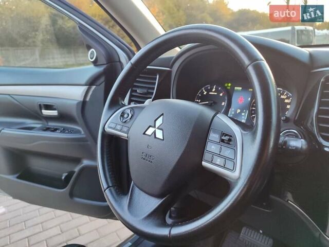Серый Мицубиси Аутлендер, объемом двигателя 2.3 л и пробегом 250 тыс. км за 13999 $, фото 83 на Automoto.ua