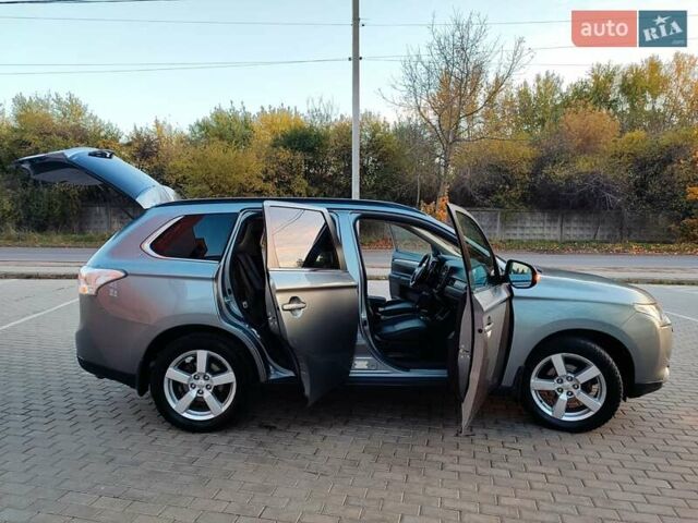 Серый Мицубиси Аутлендер, объемом двигателя 2.3 л и пробегом 250 тыс. км за 13999 $, фото 17 на Automoto.ua