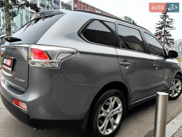 Серый Мицубиси Аутлендер, объемом двигателя 2.4 л и пробегом 209 тыс. км за 10990 $, фото 21 на Automoto.ua