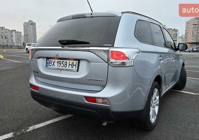 Серый Мицубиси Аутлендер, объемом двигателя 2.36 л и пробегом 54 тыс. км за 15400 $, фото 7 на Automoto.ua