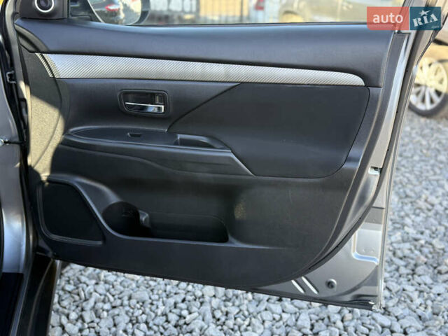 Серый Мицубиси Аутлендер, объемом двигателя 2.3 л и пробегом 193 тыс. км за 14500 $, фото 32 на Automoto.ua