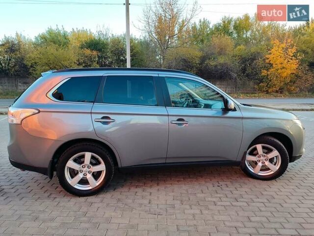 Серый Мицубиси Аутлендер, объемом двигателя 2.3 л и пробегом 250 тыс. км за 13999 $, фото 7 на Automoto.ua