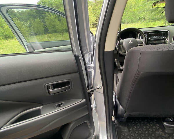 Серый Мицубиси Аутлендер, объемом двигателя 2 л и пробегом 203 тыс. км за 10999 $, фото 13 на Automoto.ua