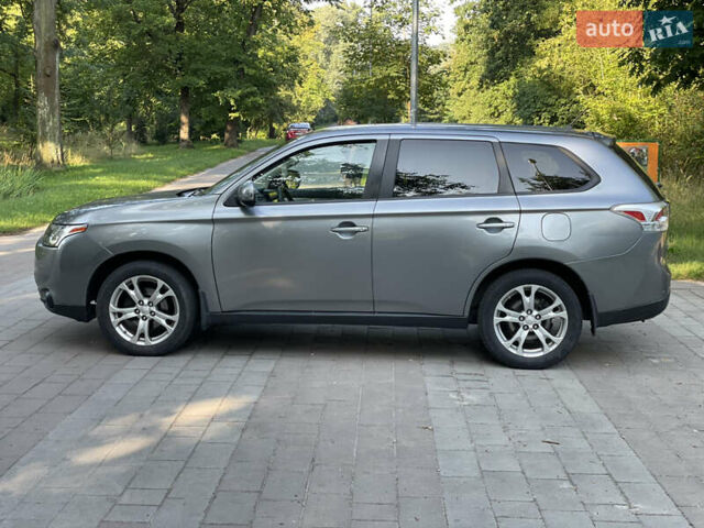 Серый Мицубиси Аутлендер, объемом двигателя 2.4 л и пробегом 150 тыс. км за 10750 $, фото 4 на Automoto.ua