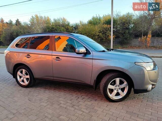 Серый Мицубиси Аутлендер, объемом двигателя 2.3 л и пробегом 250 тыс. км за 12999 $, фото 99 на Automoto.ua