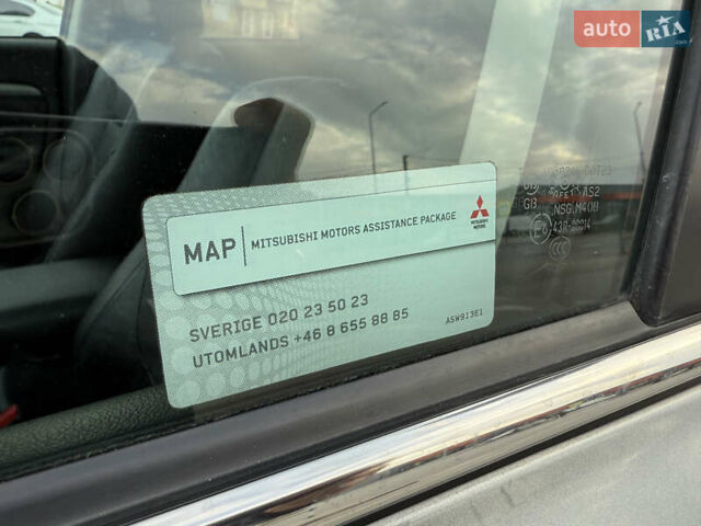 Сірий Міцубісі Аутлендер, об'ємом двигуна 2.2 л та пробігом 238 тис. км за 14000 $, фото 30 на Automoto.ua
