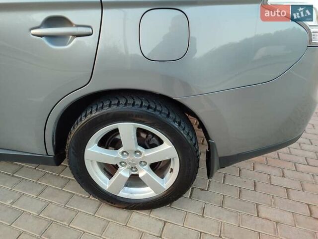 Серый Мицубиси Аутлендер, объемом двигателя 2.3 л и пробегом 250 тыс. км за 13999 $, фото 24 на Automoto.ua