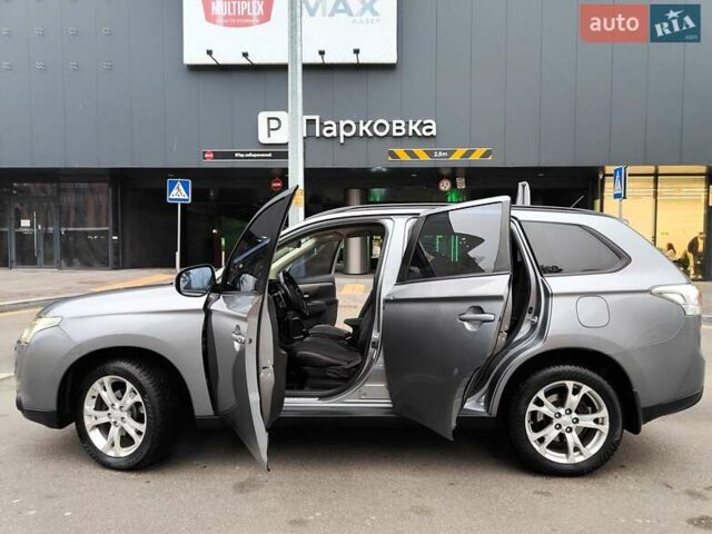 Серый Мицубиси Аутлендер, объемом двигателя 2.4 л и пробегом 209 тыс. км за 10990 $, фото 11 на Automoto.ua