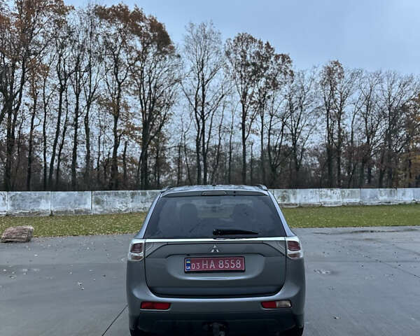 Серый Мицубиси Аутлендер, объемом двигателя 2.2 л и пробегом 206 тыс. км за 13700 $, фото 5 на Automoto.ua