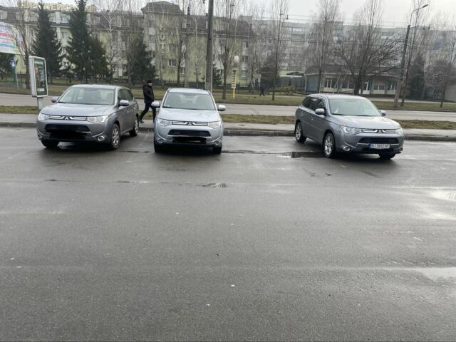 Сірий Міцубісі Аутлендер, об'ємом двигуна 2.4 л та пробігом 200 тис. км за 271 $, фото 9 на Automoto.ua