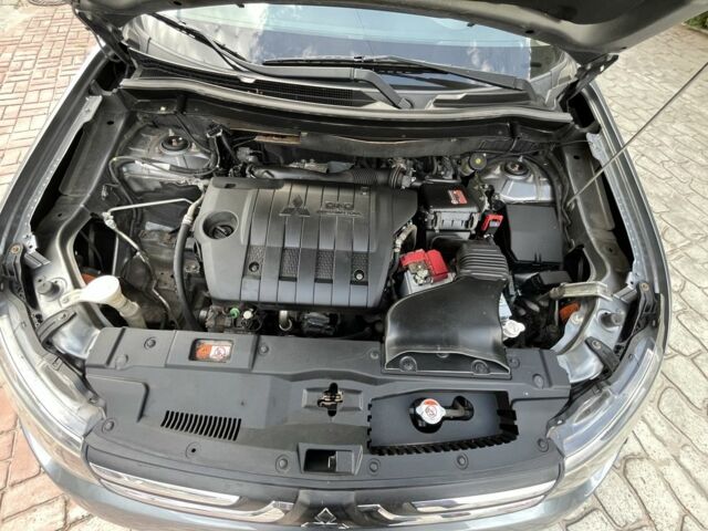 Серый Мицубиси Аутлендер, объемом двигателя 2.2 л и пробегом 239 тыс. км за 13800 $, фото 16 на Automoto.ua