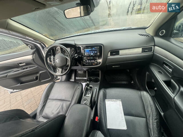 Серый Мицубиси Аутлендер, объемом двигателя 2.2 л и пробегом 224 тыс. км за 13850 $, фото 2 на Automoto.ua