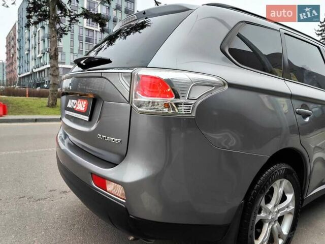 Серый Мицубиси Аутлендер, объемом двигателя 2.4 л и пробегом 209 тыс. км за 10990 $, фото 20 на Automoto.ua