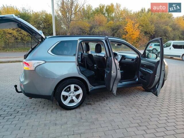 Серый Мицубиси Аутлендер, объемом двигателя 2.3 л и пробегом 250 тыс. км за 12999 $, фото 93 на Automoto.ua