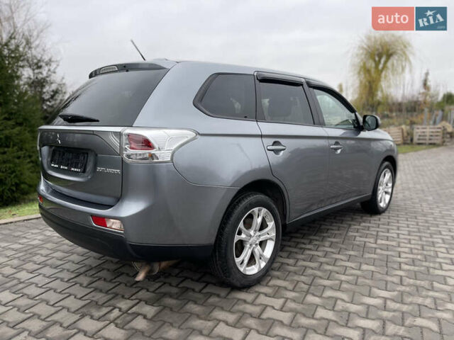 Сірий Міцубісі Аутлендер, об'ємом двигуна 2.4 л та пробігом 240 тис. км за 9999 $, фото 6 на Automoto.ua