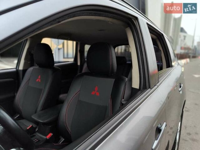 Серый Мицубиси Аутлендер, объемом двигателя 2.4 л и пробегом 209 тыс. км за 10990 $, фото 4 на Automoto.ua