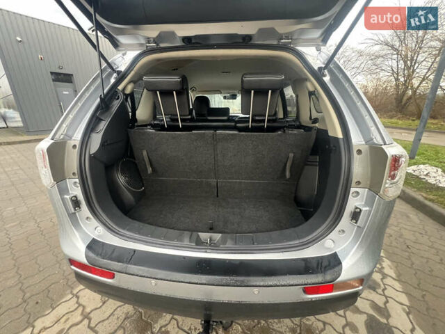 Серый Мицубиси Аутлендер, объемом двигателя 2.2 л и пробегом 224 тыс. км за 13850 $, фото 27 на Automoto.ua