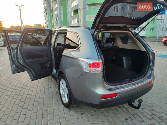 Серый Мицубиси Аутлендер, объемом двигателя 2.3 л и пробегом 250 тыс. км за 12999 $, фото 91 на Automoto.ua