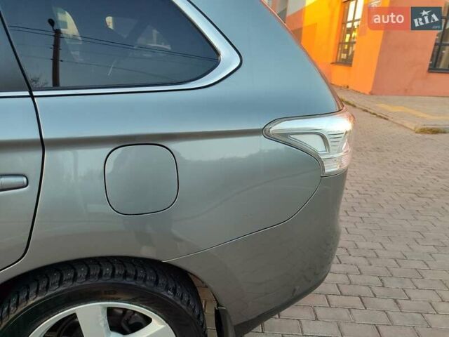 Серый Мицубиси Аутлендер, объемом двигателя 2.3 л и пробегом 250 тыс. км за 13999 $, фото 16 на Automoto.ua