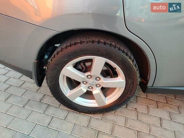 Серый Мицубиси Аутлендер, объемом двигателя 2.3 л и пробегом 250 тыс. км за 13999 $, фото 3 на Automoto.ua