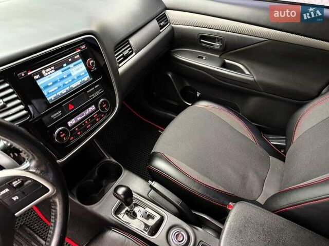 Серый Мицубиси Аутлендер, объемом двигателя 2.4 л и пробегом 209 тыс. км за 10990 $, фото 39 на Automoto.ua