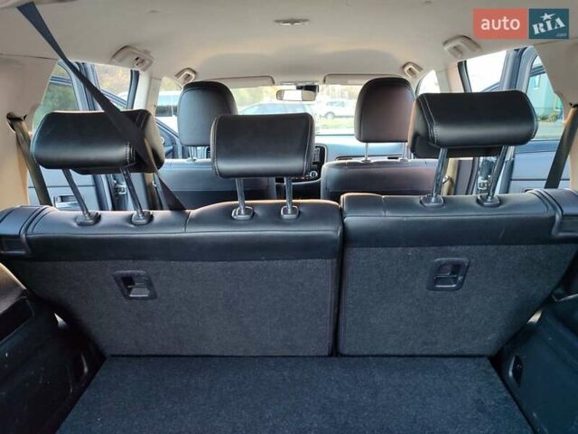 Серый Мицубиси Аутлендер, объемом двигателя 2.3 л и пробегом 250 тыс. км за 13499 $, фото 54 на Automoto.ua