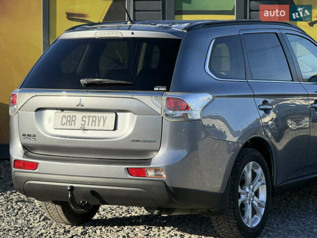 Серый Мицубиси Аутлендер, объемом двигателя 2.3 л и пробегом 193 тыс. км за 14500 $, фото 23 на Automoto.ua