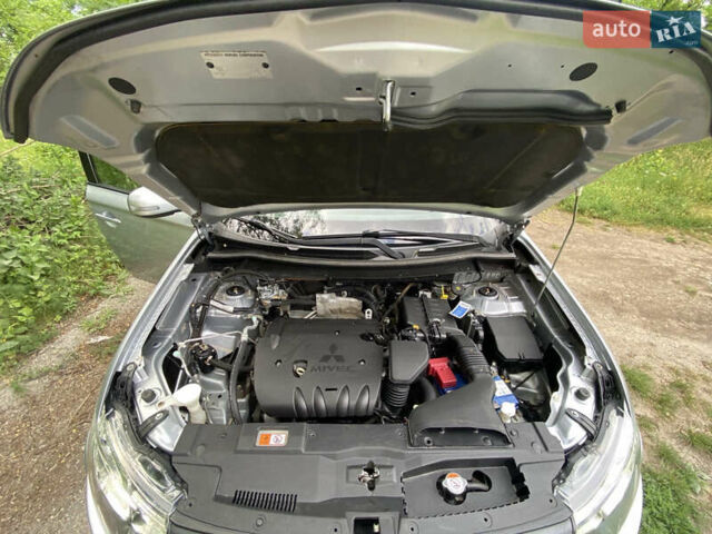 Серый Мицубиси Аутлендер, объемом двигателя 2 л и пробегом 203 тыс. км за 10999 $, фото 22 на Automoto.ua