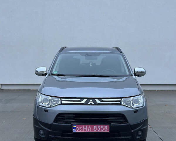 Серый Мицубиси Аутлендер, объемом двигателя 2.2 л и пробегом 206 тыс. км за 13700 $, фото 1 на Automoto.ua