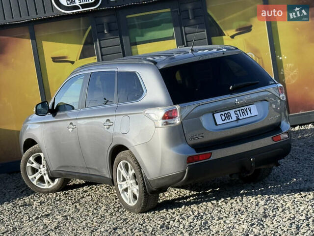 Серый Мицубиси Аутлендер, объемом двигателя 2.3 л и пробегом 193 тыс. км за 14500 $, фото 13 на Automoto.ua