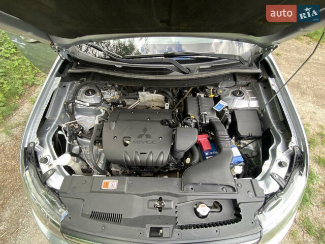 Серый Мицубиси Аутлендер, объемом двигателя 2 л и пробегом 203 тыс. км за 10999 $, фото 19 на Automoto.ua