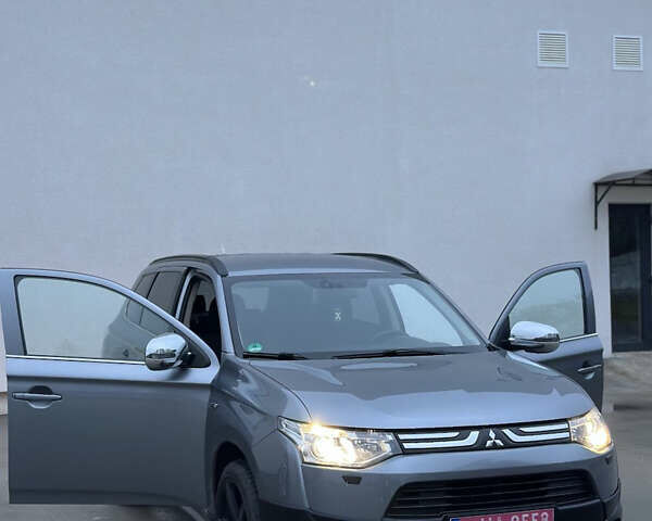 Серый Мицубиси Аутлендер, объемом двигателя 2.2 л и пробегом 206 тыс. км за 13700 $, фото 8 на Automoto.ua