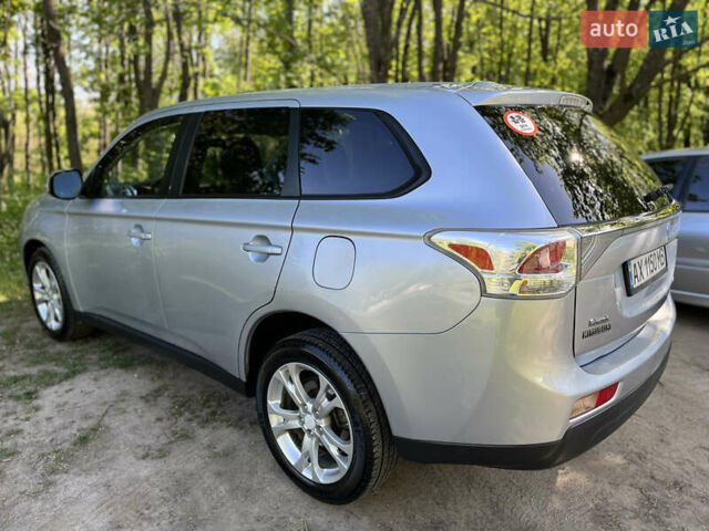 Сірий Міцубісі Аутлендер, об'ємом двигуна 2.36 л та пробігом 162 тис. км за 10500 $, фото 4 на Automoto.ua