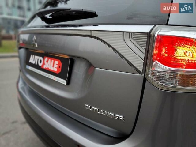 Серый Мицубиси Аутлендер, объемом двигателя 2.4 л и пробегом 209 тыс. км за 10990 $, фото 18 на Automoto.ua