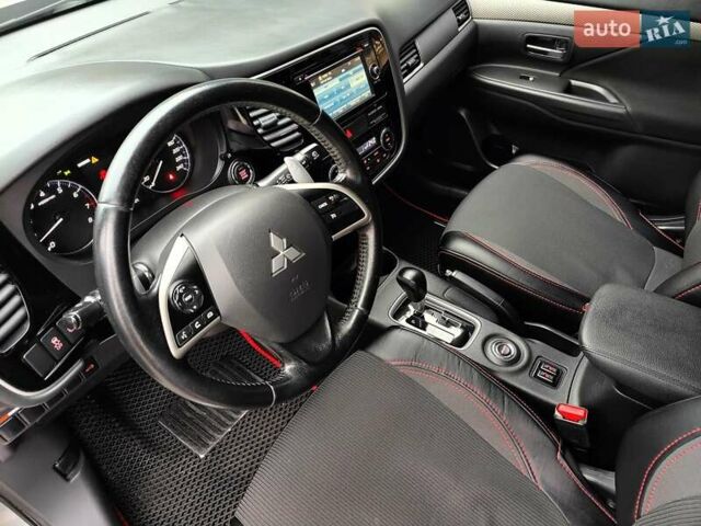 Серый Мицубиси Аутлендер, объемом двигателя 2.4 л и пробегом 209 тыс. км за 10990 $, фото 36 на Automoto.ua