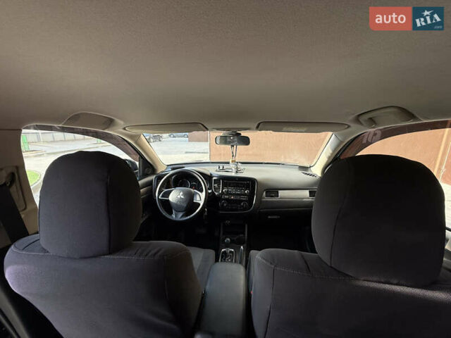 Серый Мицубиси Аутлендер, объемом двигателя 2 л и пробегом 137 тыс. км за 13700 $, фото 12 на Automoto.ua