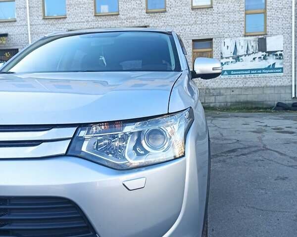 Серый Мицубиси Аутлендер, объемом двигателя 2.4 л и пробегом 197 тыс. км за 14000 $, фото 40 на Automoto.ua