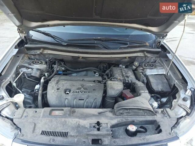 Серый Мицубиси Аутлендер, объемом двигателя 2.4 л и пробегом 197 тыс. км за 14000 $, фото 27 на Automoto.ua