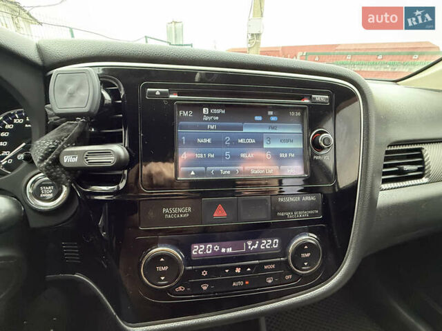 Серый Мицубиси Аутлендер, объемом двигателя 2.36 л и пробегом 198 тыс. км за 13990 $, фото 20 на Automoto.ua