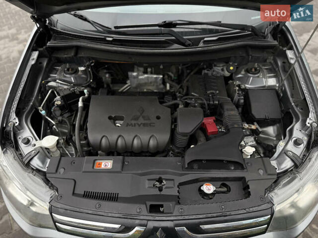 Сірий Міцубісі Аутлендер, об'ємом двигуна 2.4 л та пробігом 190 тис. км за 13000 $, фото 9 на Automoto.ua