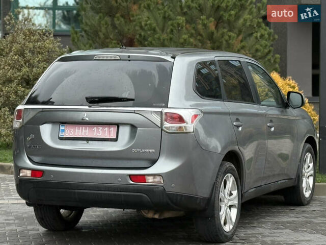 Сірий Міцубісі Аутлендер, об'ємом двигуна 2.4 л та пробігом 190 тис. км за 13000 $, фото 3 на Automoto.ua
