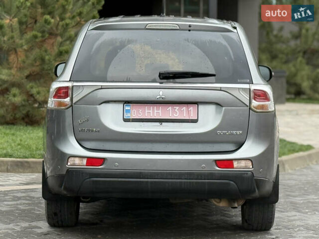 Сірий Міцубісі Аутлендер, об'ємом двигуна 2.4 л та пробігом 190 тис. км за 13000 $, фото 2 на Automoto.ua