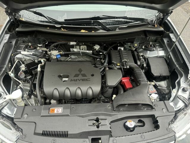 Сірий Міцубісі Аутлендер, об'ємом двигуна 2.4 л та пробігом 219 тис. км за 10800 $, фото 4 на Automoto.ua