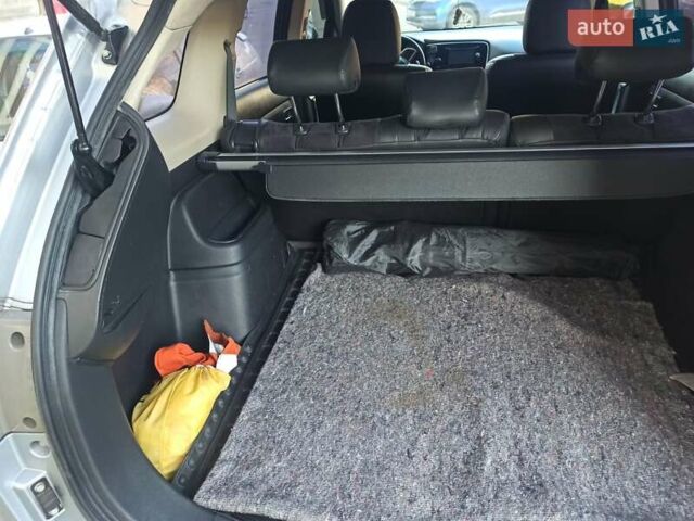 Серый Мицубиси Аутлендер, объемом двигателя 2.4 л и пробегом 197 тыс. км за 14000 $, фото 20 на Automoto.ua